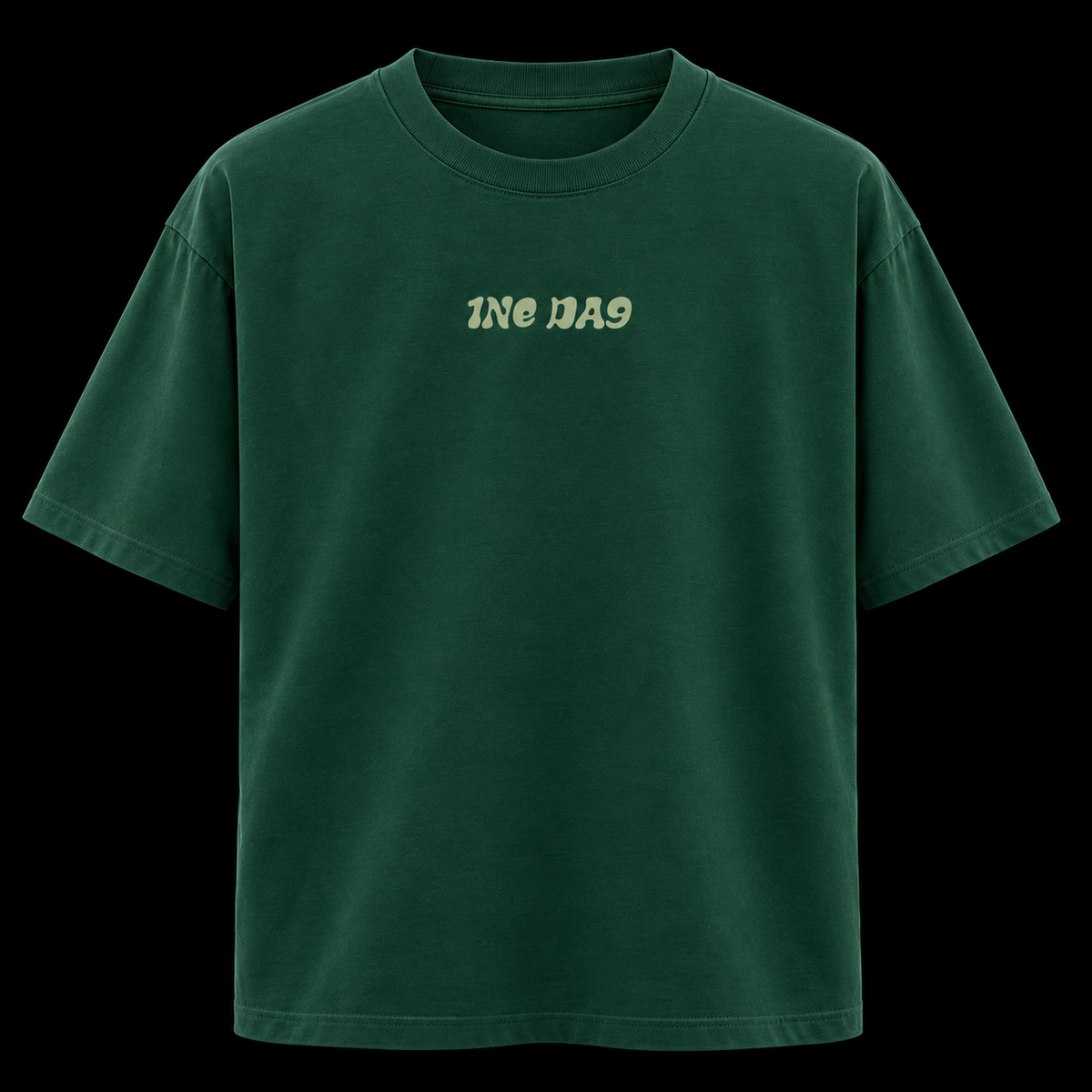 A dark green short-sleeve t-shirt with the text 'ONE DAY' printed in a light beige retro font on the chest, displayed against a solid black background.